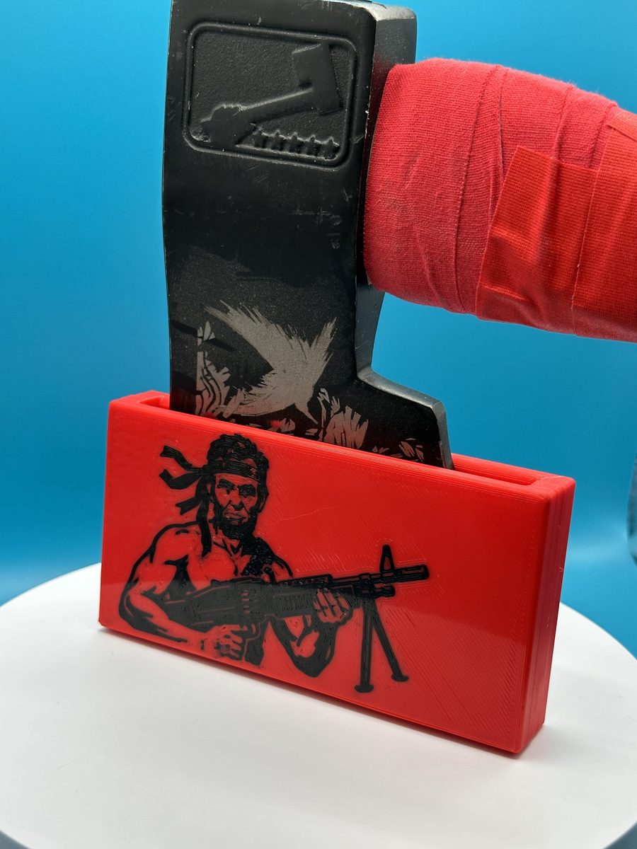 Custom engraved Rambo sheath on hatchet