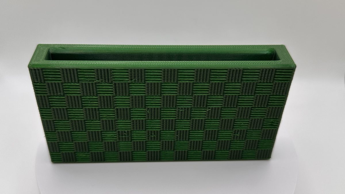 Green crosshatch hatchet sheath from above