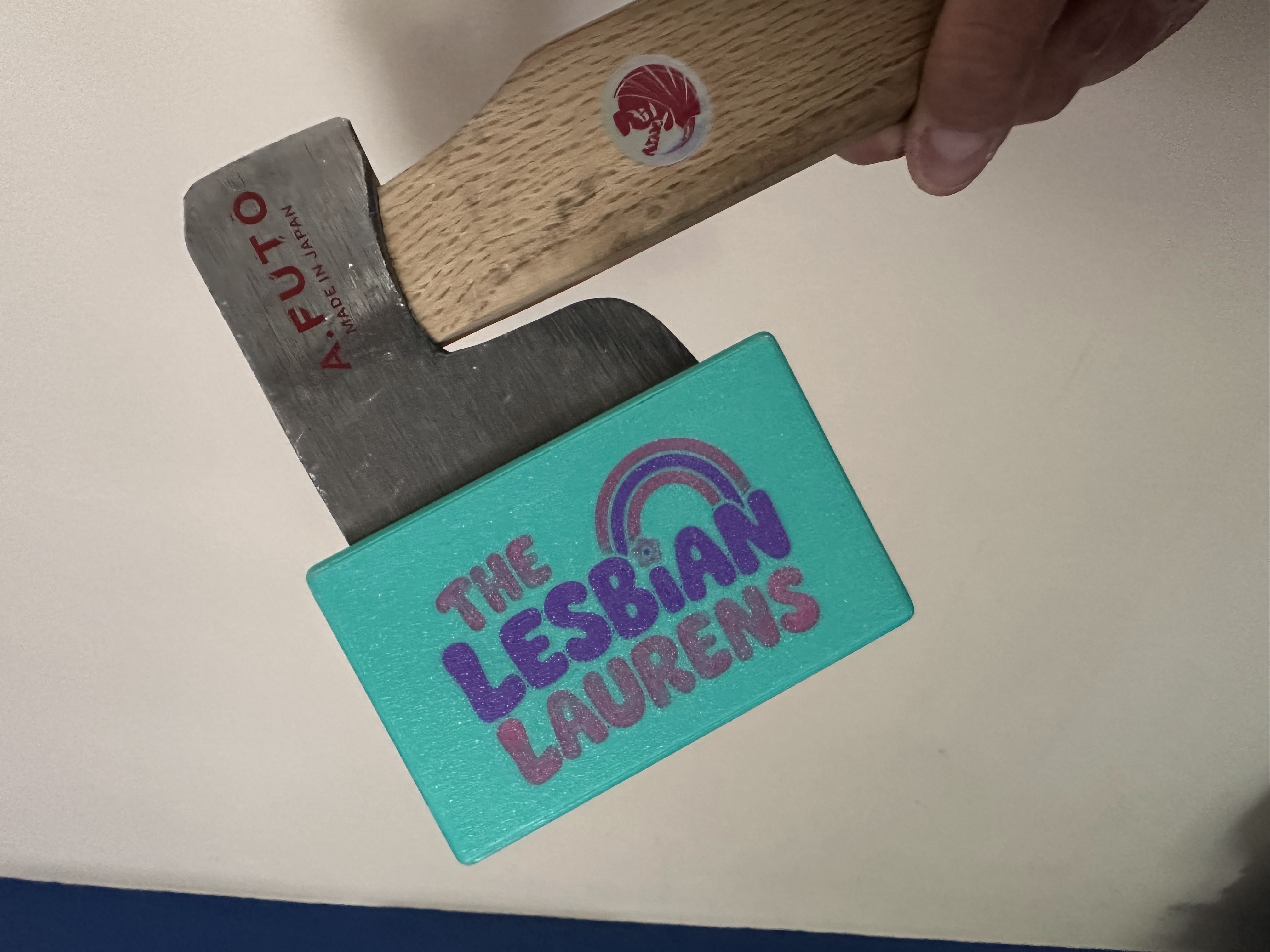 The Lesbian Laurens custom teal hatchet sheath