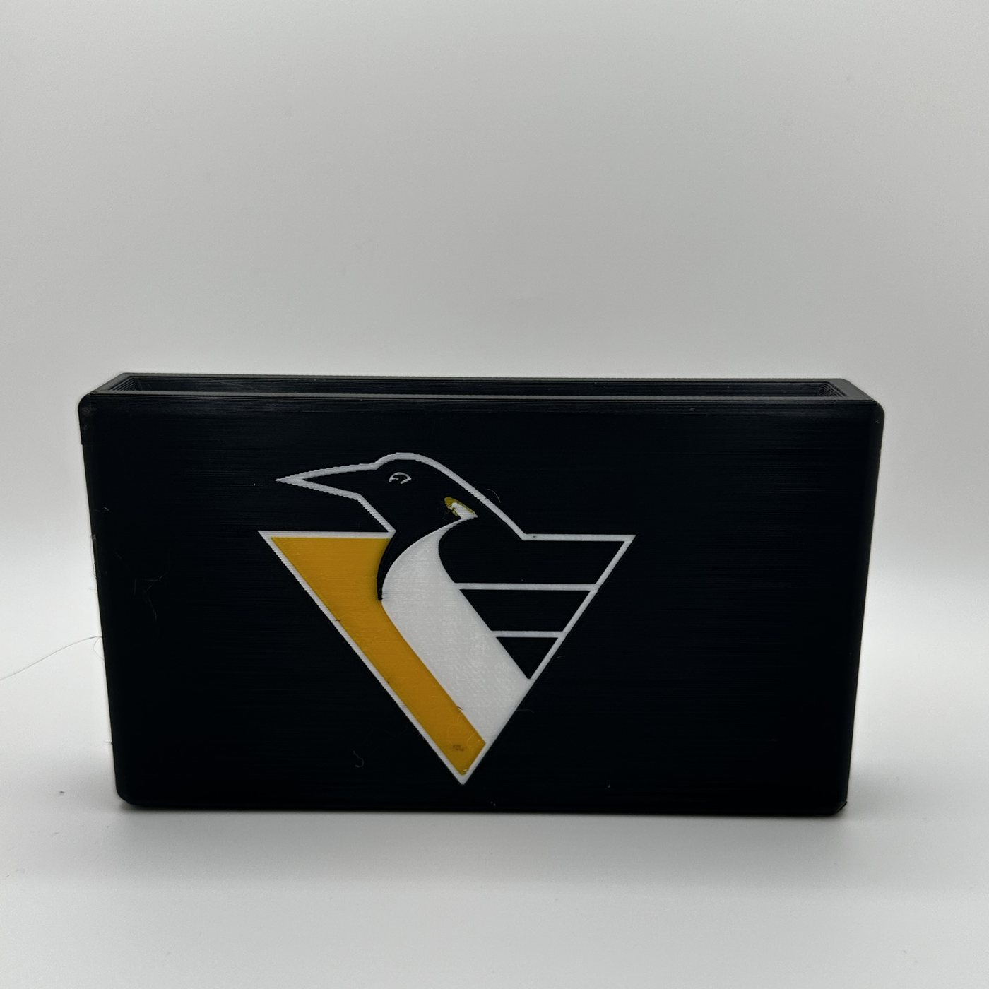 Custom hockey team hatchet sheath in black, white and gold
